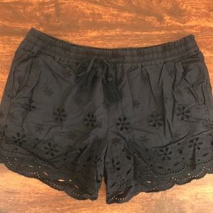 Cotton shorts with eyelet design detail, lined